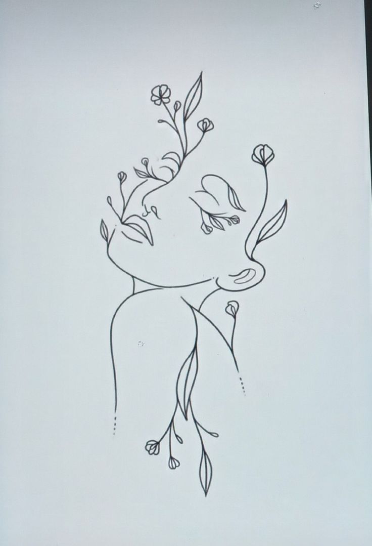 Rosto de mulher estilizado com flores e ramos para desenhar