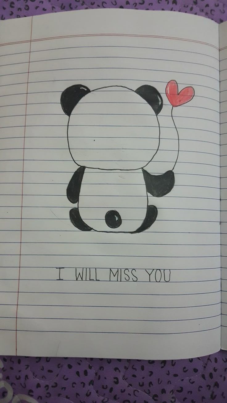 Ursinho panda segurando um balão de coração para desenhar