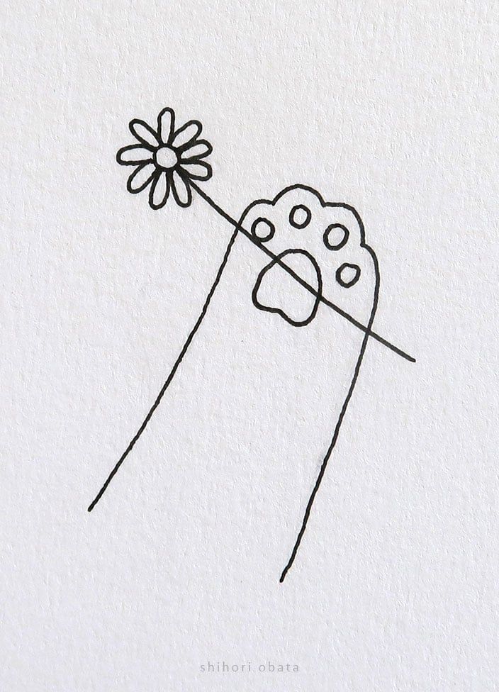 Pata de animal segurando uma flor para desenhar fácil