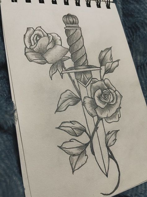Desenho de Rosa com Espada em caderno para inspiração