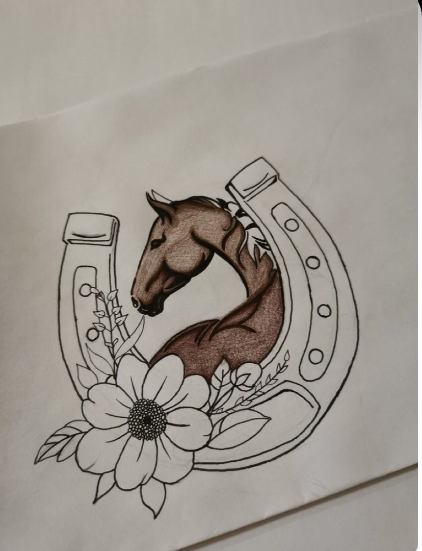 Desenhos de Cavalo: Cavalo dentro de ferradura com flores