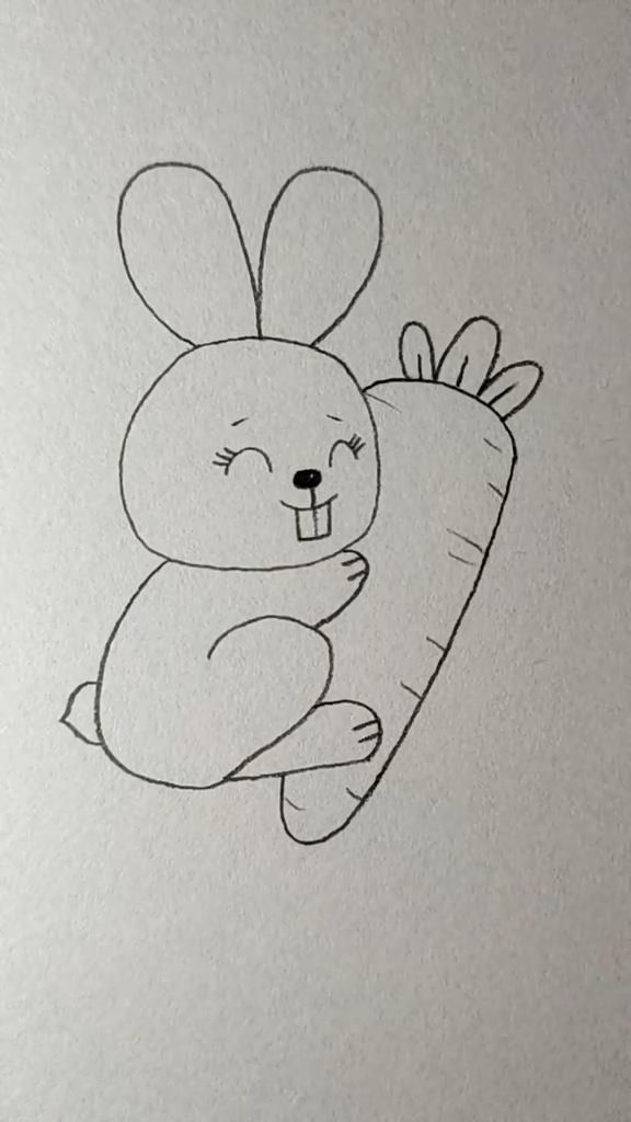 Desenho de Coelho: Coelho fofo segurando uma cenoura
